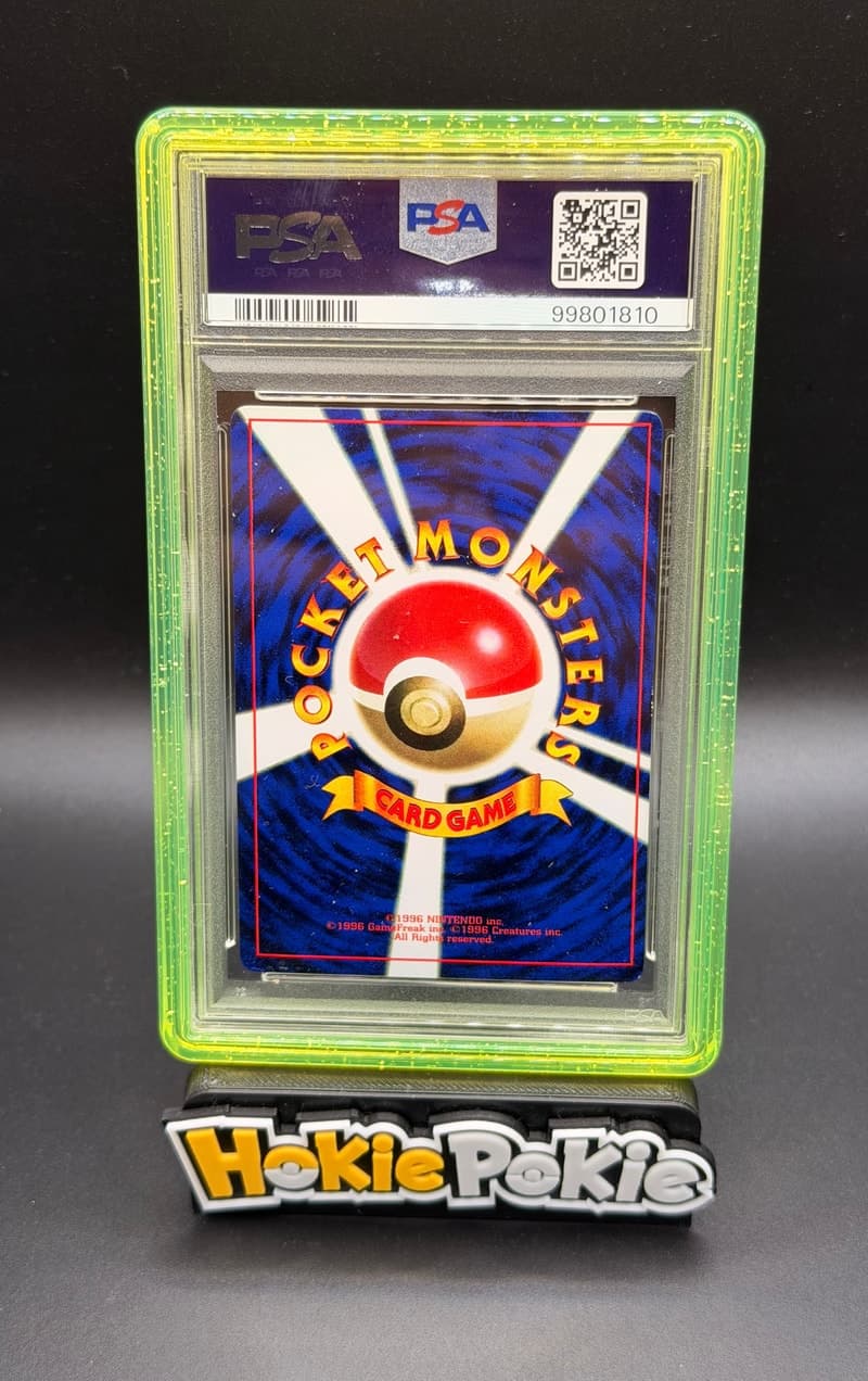 Surfing Pikachu, PSA 7 graded, card 25 from the 1997 CoroCoro Comics Promo (Japanese) Pokémon TCG set. Back of the graded slab.