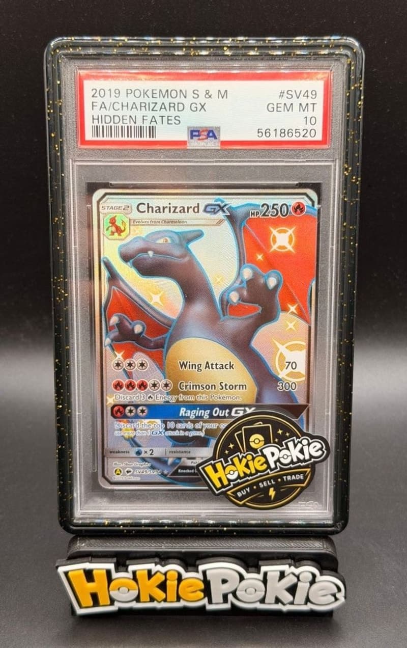Charizard GX, PSA 10 graded, card SV49 / SV94 from the 2019 Hidden Fates Pokémon TCG set. Actual photo of the card in hand.