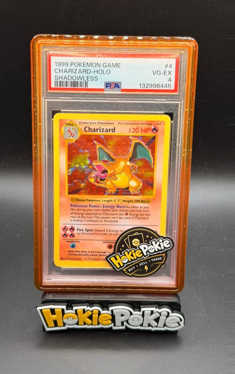Charizard, PSA 4 graded, card 4 of 102 from the 1999 Base Set Pokémon TCG set.