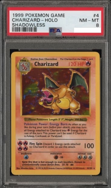 Charizard, PSA 8 graded, card 4 of 102 from the 1999 Base Set Pokémon TCG set.