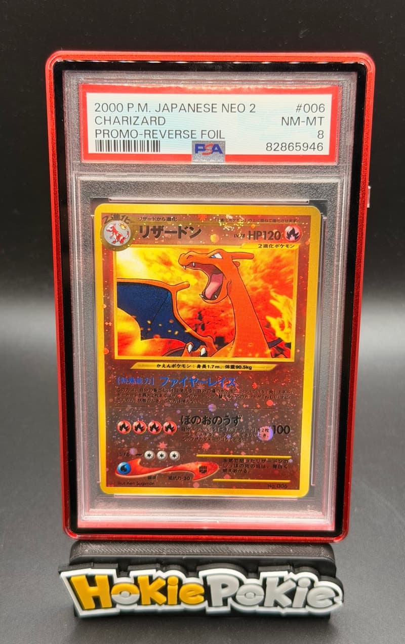Charizard, PSA 8 graded, card 006 from the 2000 Neo 2 Promo (Japanese) Pokémon TCG set.