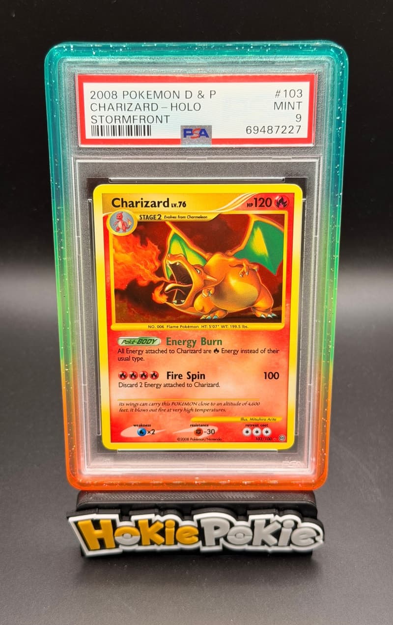 Charizard, PSA 9 graded, card 103 of 100 from the 2008 Stormfront Pokémon TCG set.