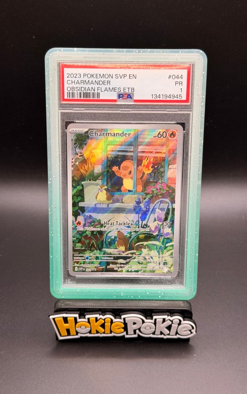 Charmander, PSA 1 graded, card SVP 044 from the 2023 SVP Black Star Promo Pokémon TCG set.