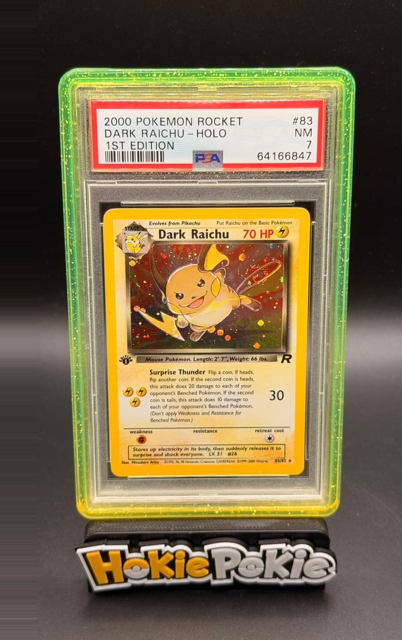 Dark Raichu, PSA 7 graded, card 83 of 82 from the 2000 Team Rocket Pokémon TCG set.