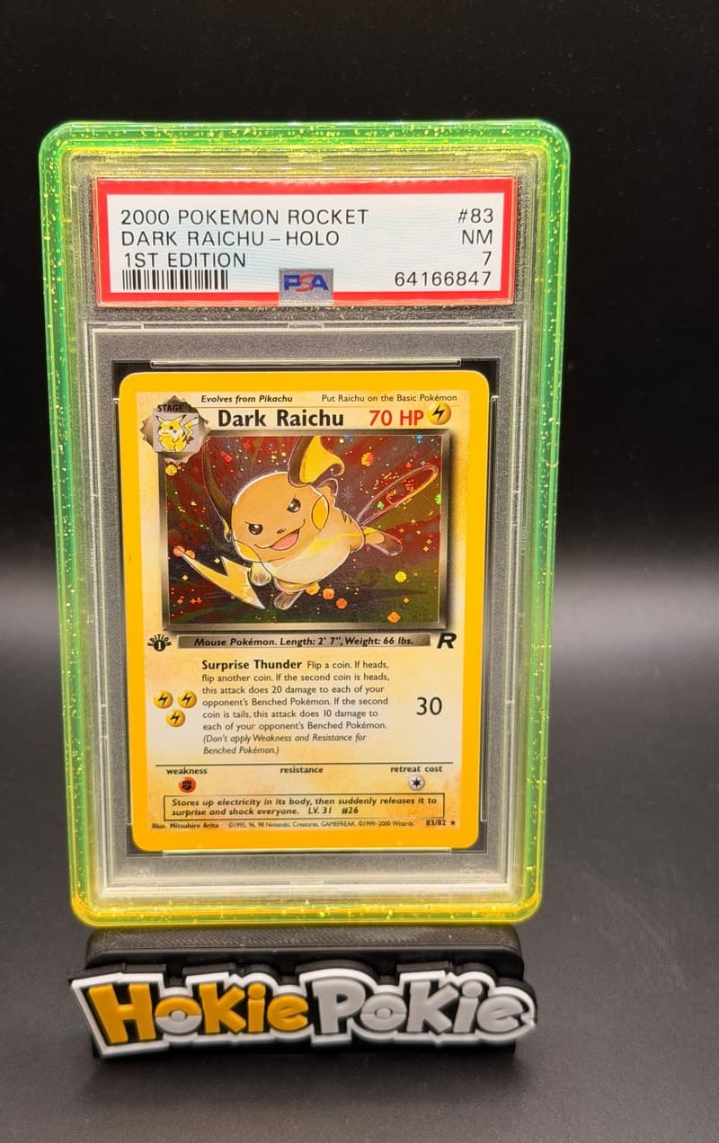 Dark Raichu, PSA 7 graded, card 83 of 82 from the 2000 Team Rocket Pokémon TCG set.