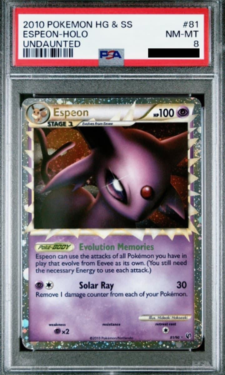 Espeon Prime, PSA 8 graded, card 81 of 90 from the 2010 HS Undaunted Pokémon TCG set.