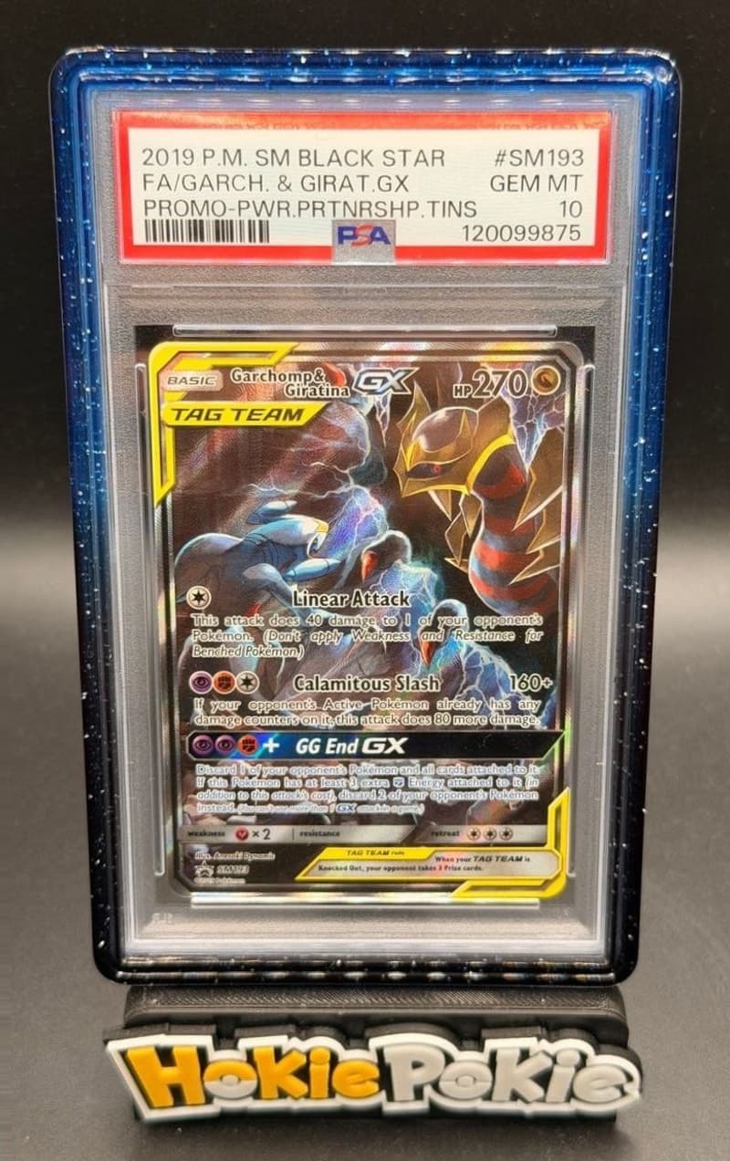 Garchomp & Giratina GX, PSA 10 graded, card SM193 from the 2018 SM Black Star Promos Pokémon TCG set. Actual photo of the card in hand.
