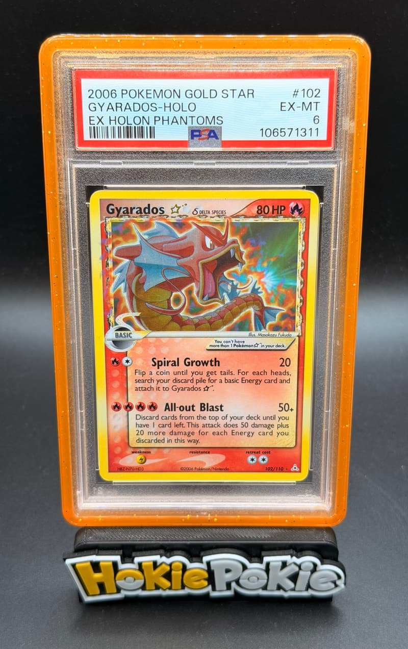 Gyarados Gold Star, PSA 6 graded, card 102 of 110 from the 2006 EX Holon Phantoms Pokémon TCG set.