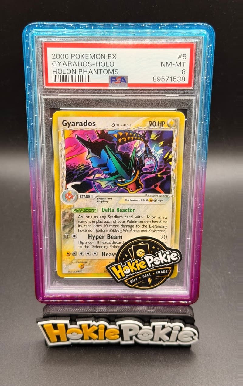 Gyarados, PSA 8 graded, card 8 of 110 from the 2006 EX Holon Phantoms Pokémon TCG set.