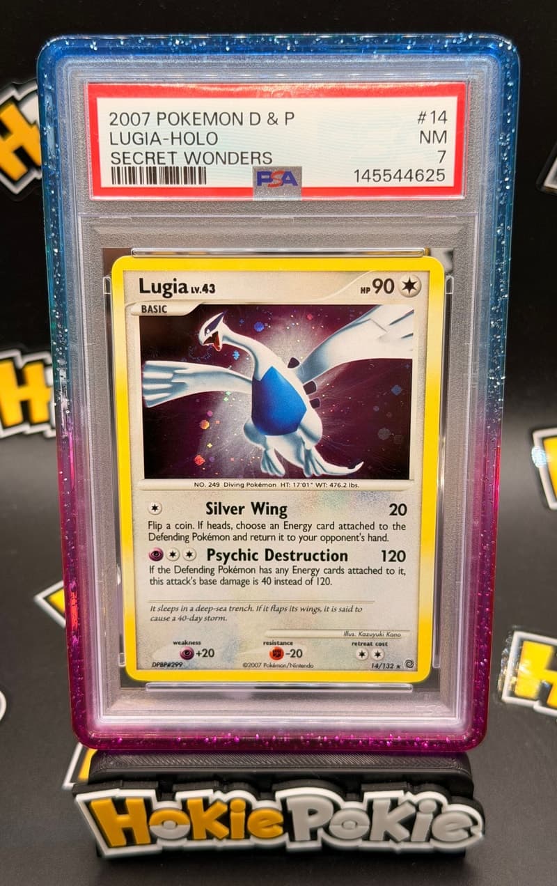 Lugia, PSA 7 graded, card 14 of 132 from the 2007 Secret Wonders Pokémon TCG set. Actual photo of the card in hand.