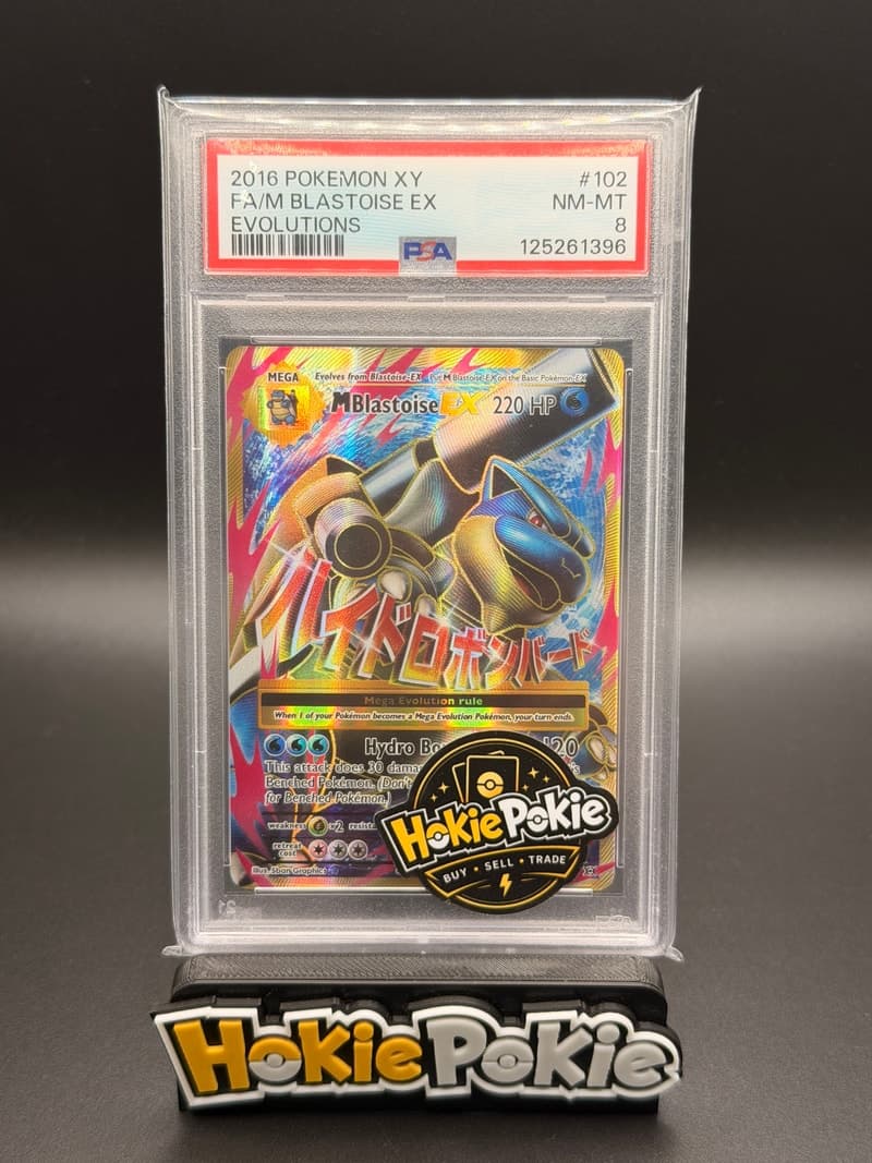 M Blastoise EX, PSA 8 graded, card 102 of 108 from the 2016 XY Evolutions Pokémon TCG set. Actual photo of the card in hand.