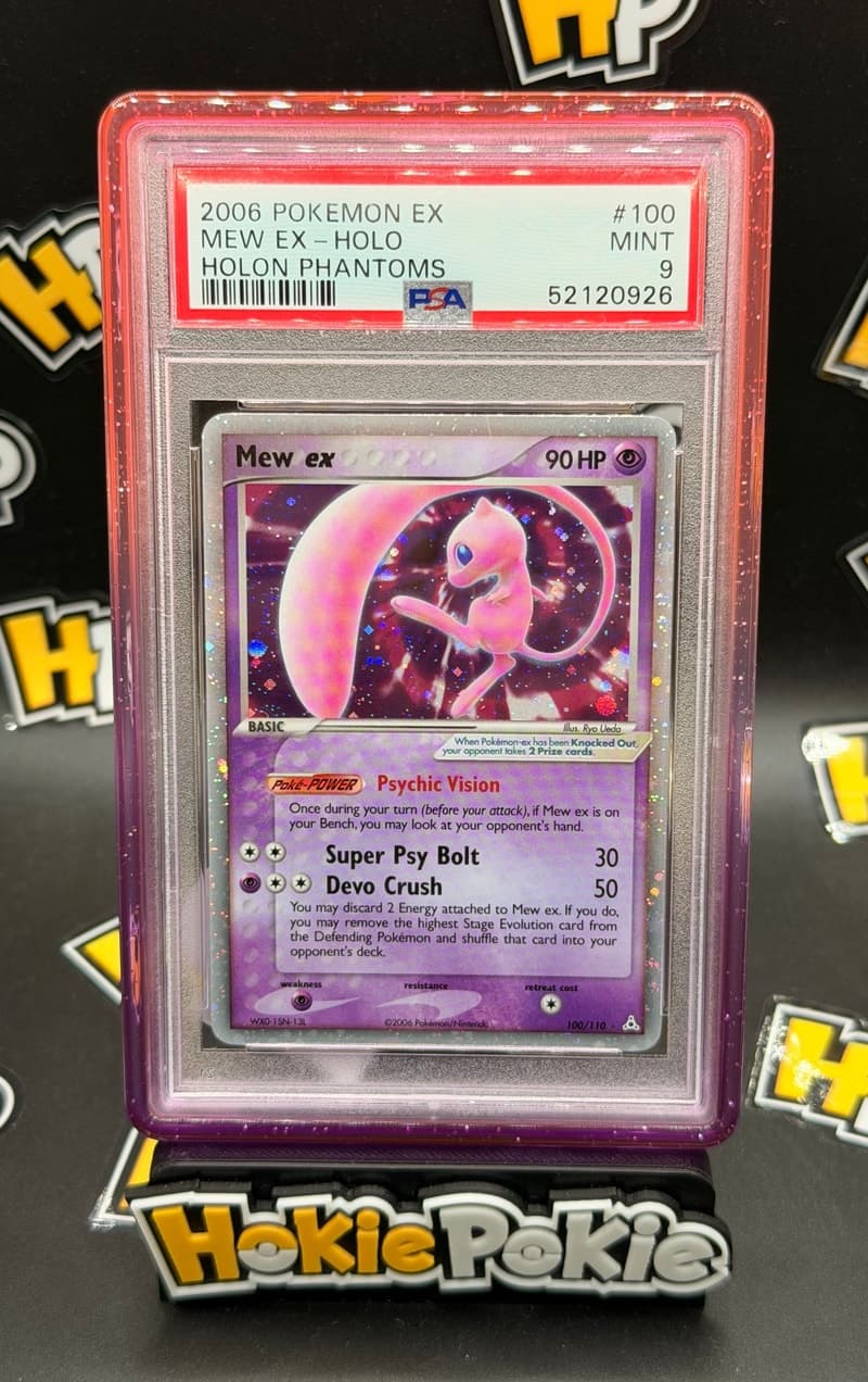 Mew ex, PSA 9 graded, card 100 of 110 from the 2006 EX Holon Phantoms Pokémon TCG set. Actual photo of the card in hand.
