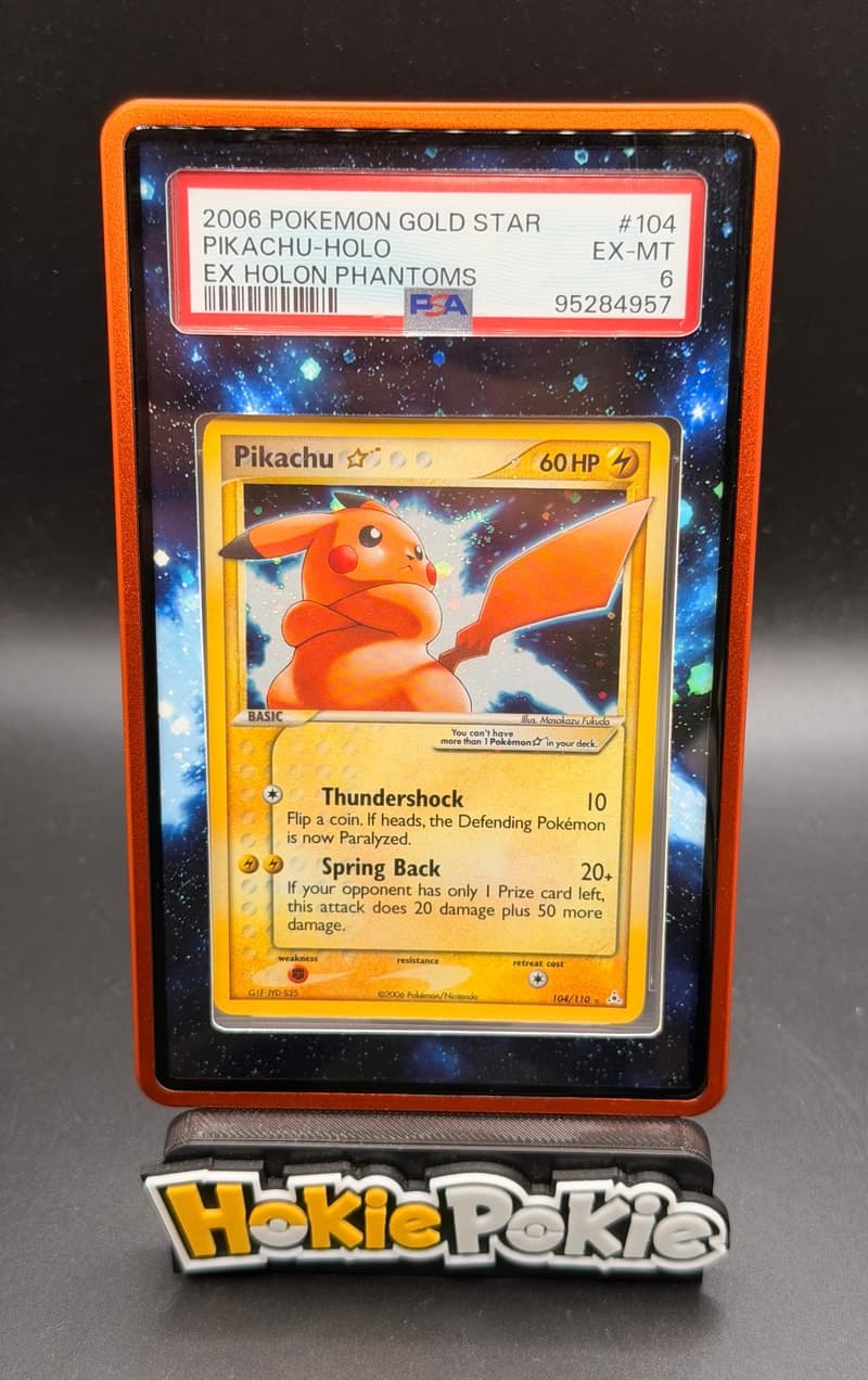 Pikachu Gold Star 🌀, PSA 6 graded, card 104 of 110 from the 2006 EX Holon Phantoms Pokémon TCG set.