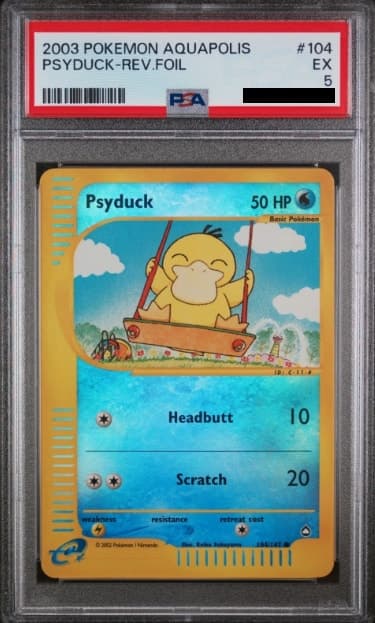 Psyduck, PSA 5 graded, card 104 of 147 from the 2003 Aquapolis Pokémon TCG set.