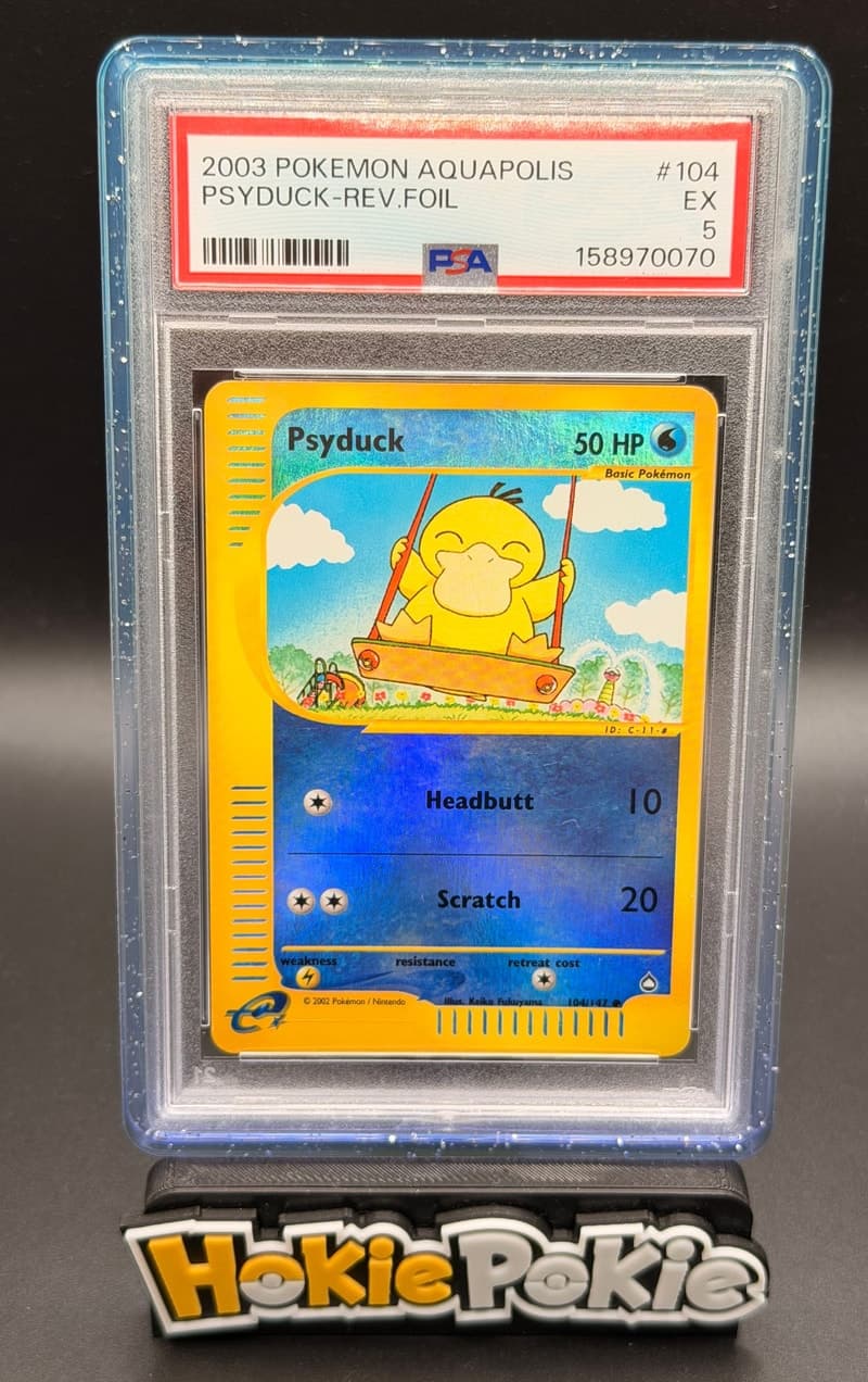 Psyduck, PSA 5 graded, card 104 of 147 from the 2003 Aquapolis Pokémon TCG set.