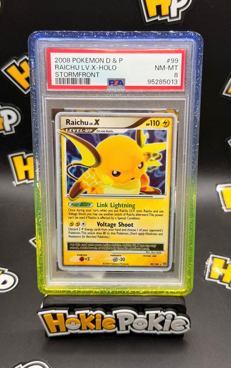 Raichu LV.X, PSA 8 graded, card 99 of 100 from the 2008 Stormfront Pokémon TCG set. Actual photo of the card in hand.