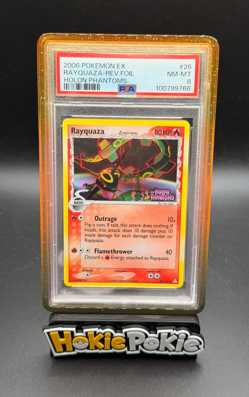 Rayquaza, PSA 8 graded, card 26 of 110 from the 2006 EX Holon Phantoms Pokémon TCG set.