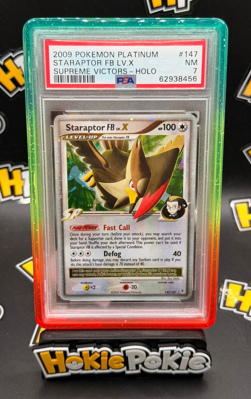 Staraptor FB LV.X, PSA 7 graded, card 147 of 147 from the 2009 Supreme Victors Pokémon TCG set. Actual photo of the card in hand.