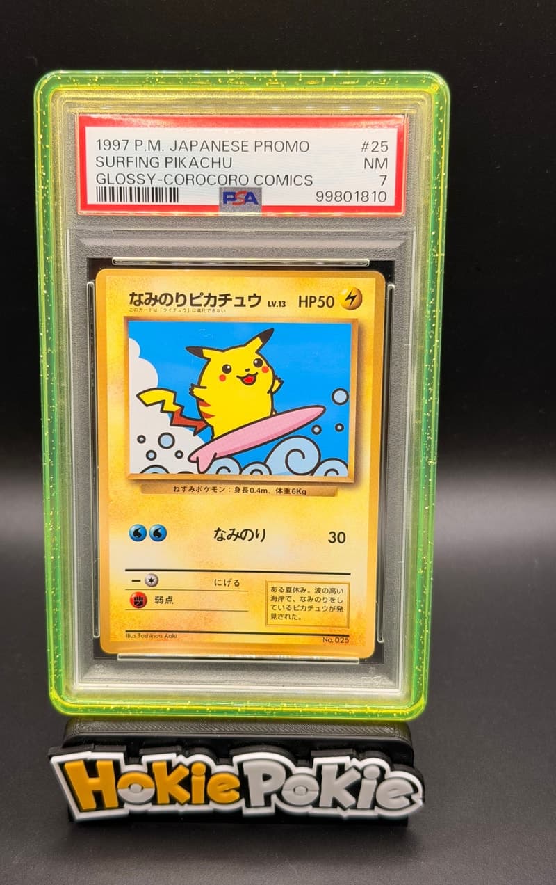 Surfing Pikachu, PSA 7 graded, card 25 from the 1997 CoroCoro Comics Promo (Japanese) Pokémon TCG set.