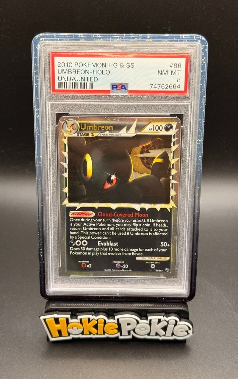 Umbreon Prime, PSA 8 graded, card 86 of 90 from the 2010 HS Undaunted Pokémon TCG set.