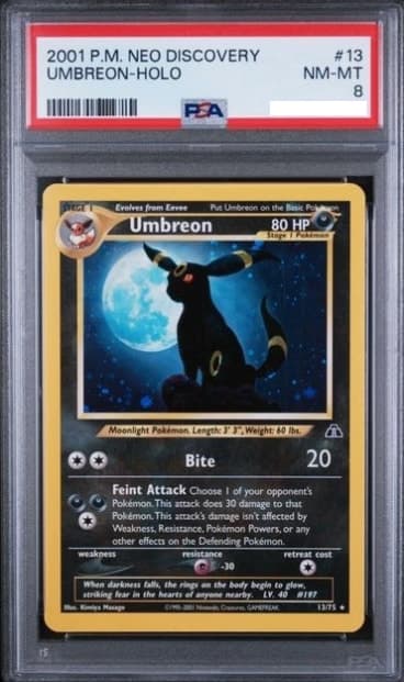 Umbreon, PSA 8 graded, card 13 of 75 from the 2001 Neo Discovery Pokémon TCG set.