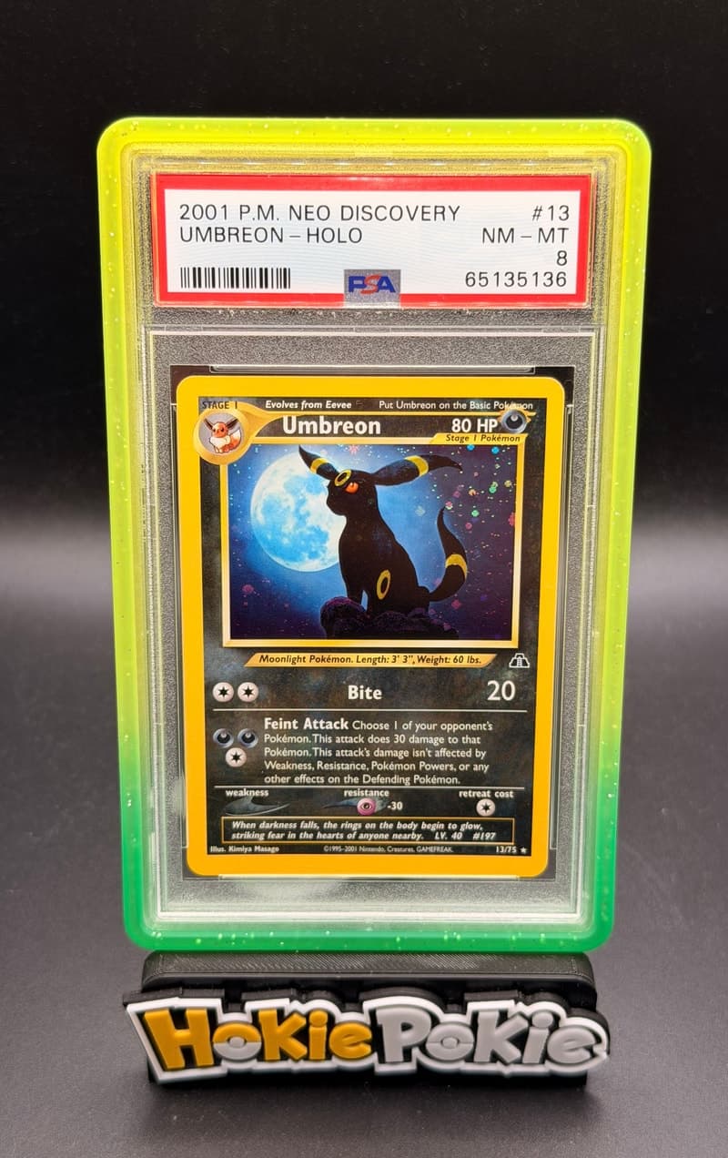 Umbreon, PSA 8 graded, card 13 of 75 from the 2001 Neo Discovery Pokémon TCG set.